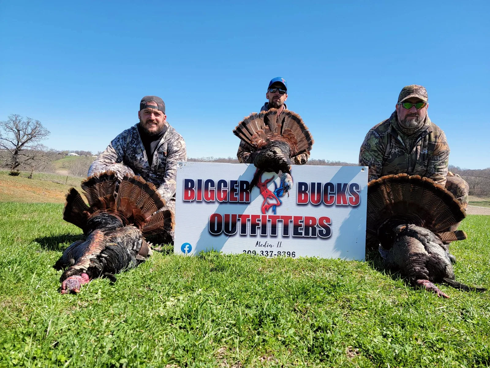 Three hunters with spring gobblers taken at Bigger Bucks Outfitters in Media Illinois